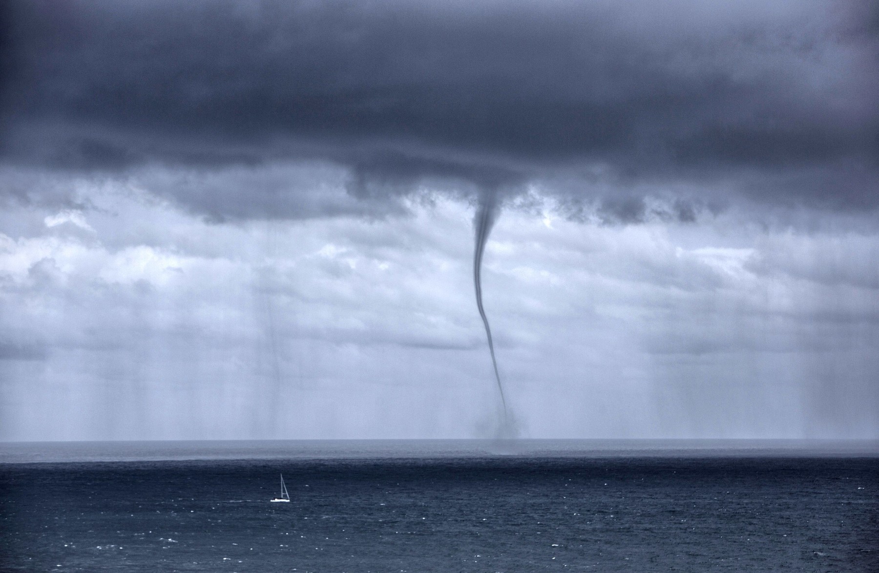 1,000ft waterspout forms behind yacht, Sydney, Australia - 08 Jan 2016