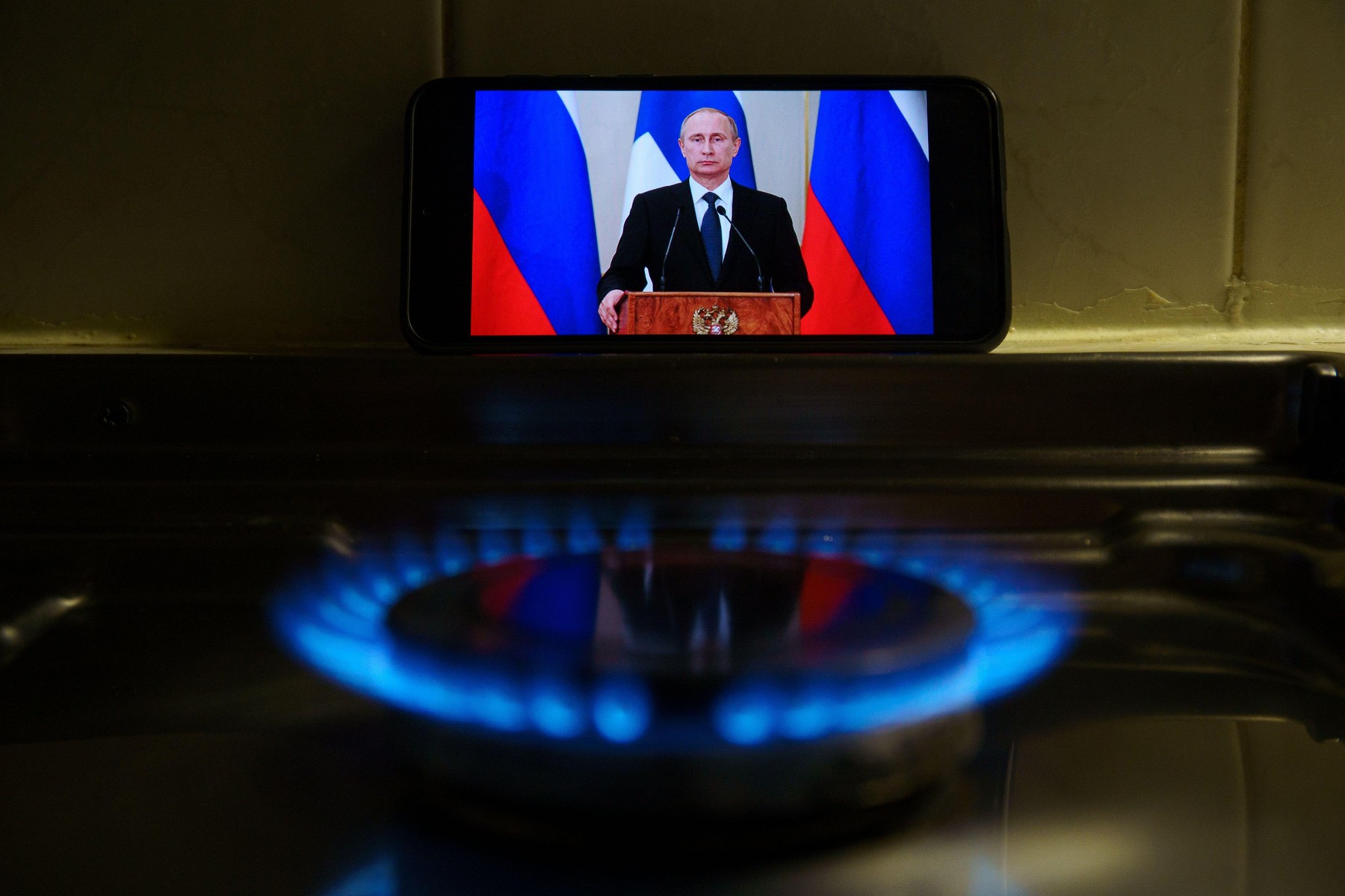Gas at home for cooking. Natural gas (also called fossil gas) and Russian flag. Nord Stream is a natural gas pipeline through the Baltic Sea from Russ