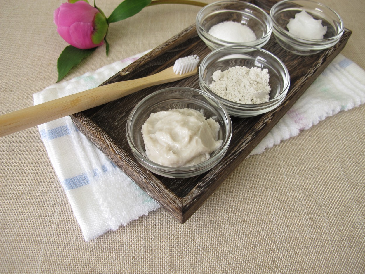 Homemade toothpaste from three ingredients with coconut oil, xylitol and chalk powder