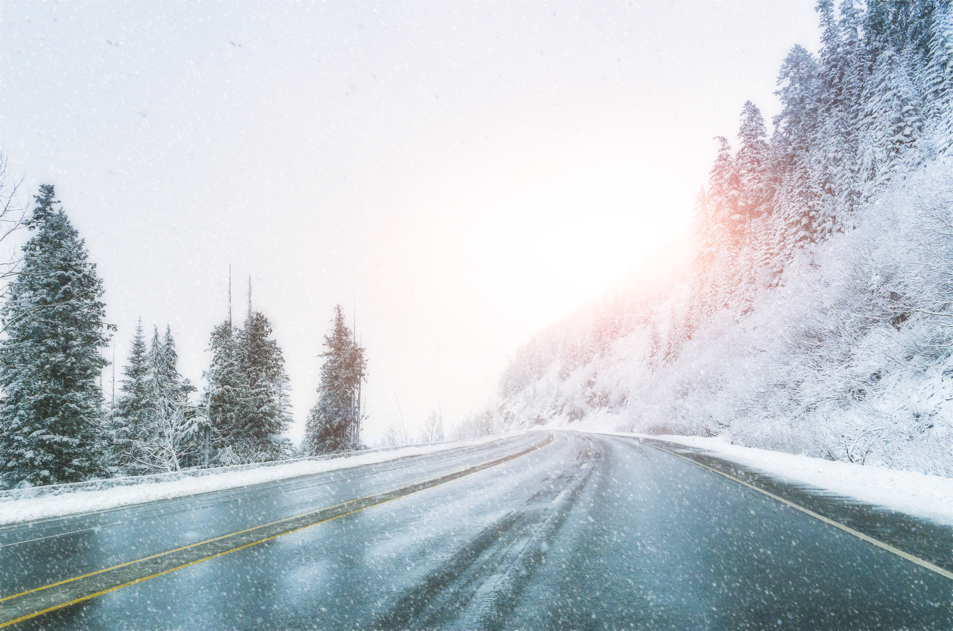 Scenic,View,Of,Empty,Road,With,Snow,Covered,Landscape,While