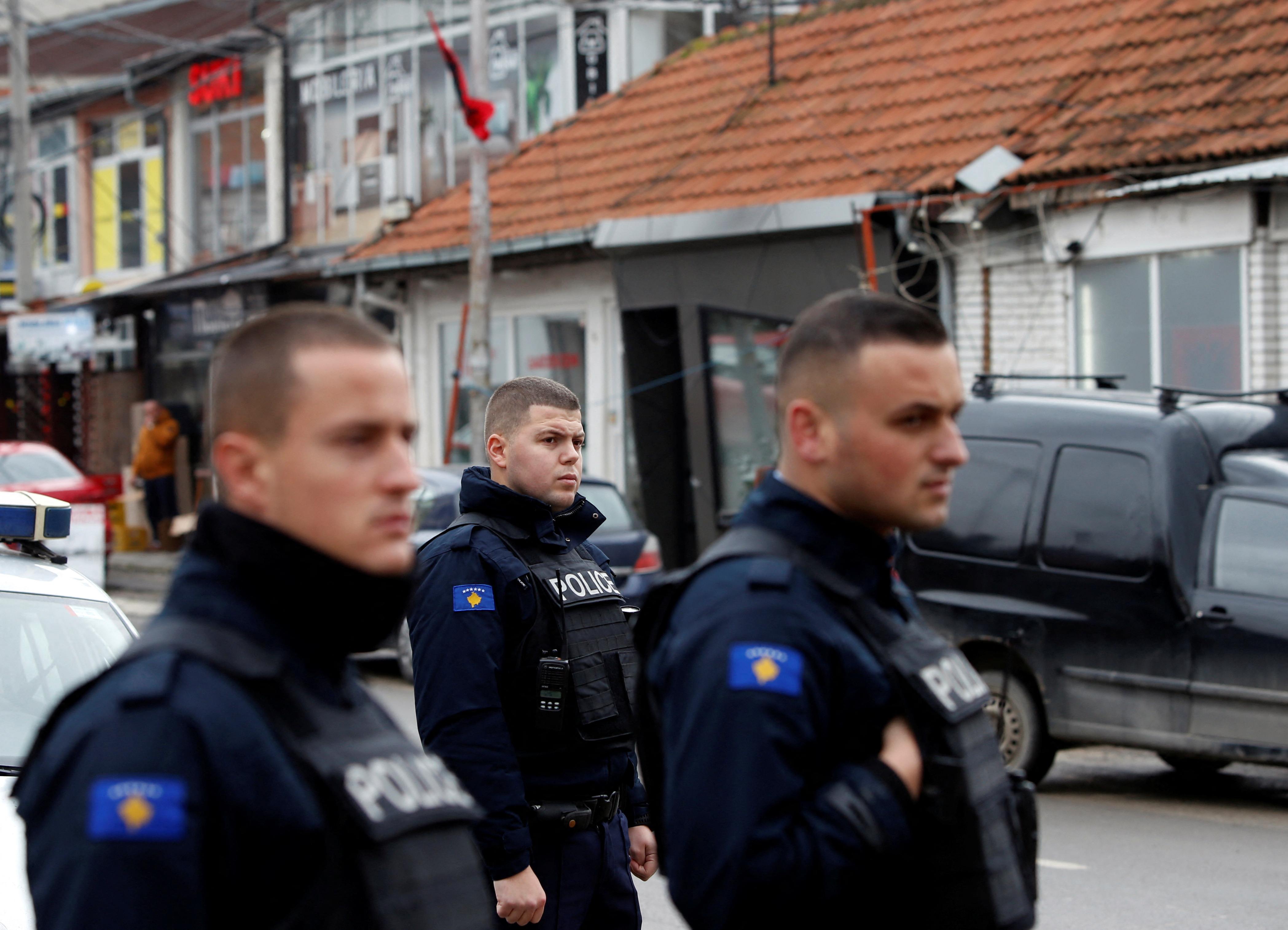 Kosovo police officers patrol in ethnically mixed area in North Mitrovica