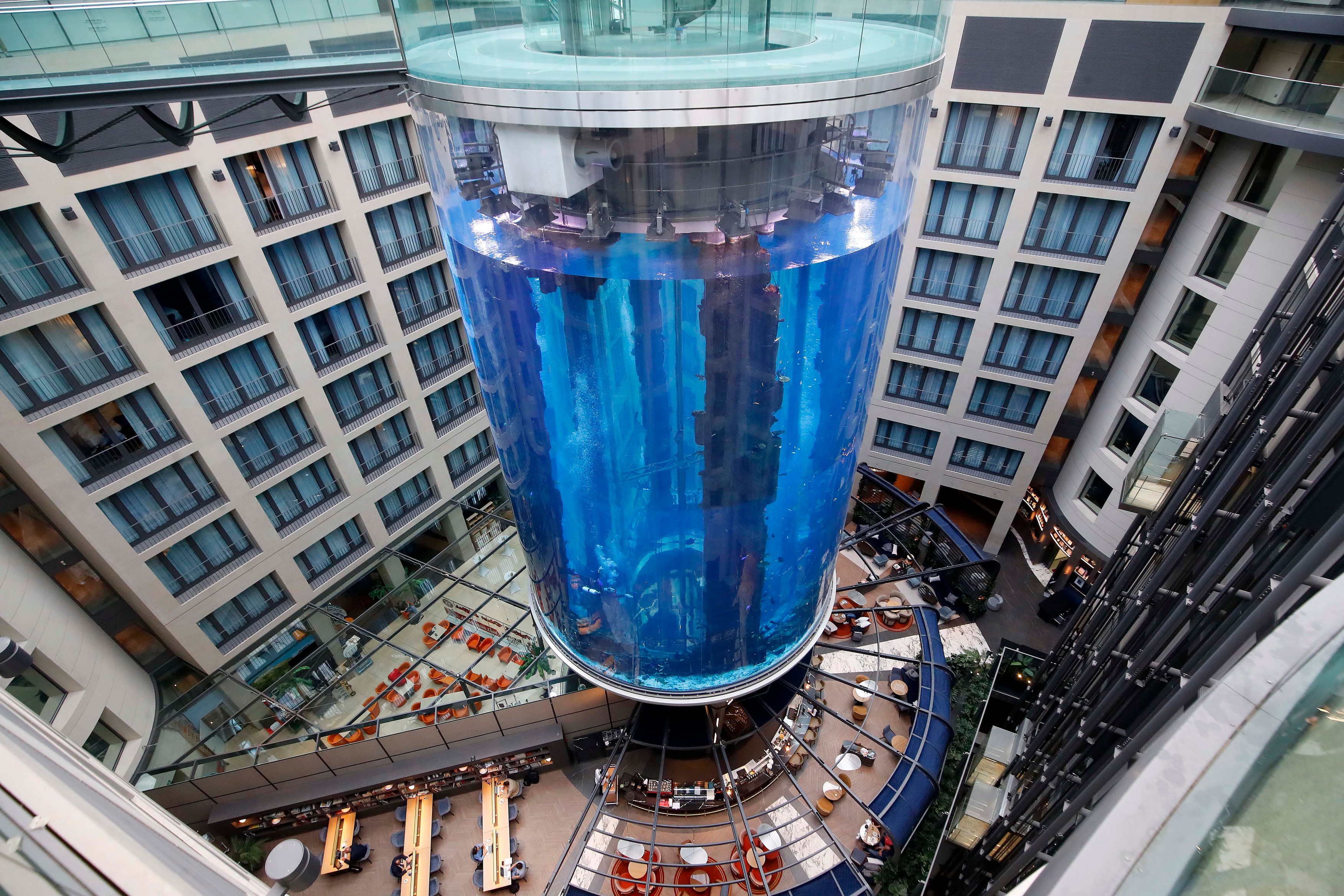 Germany, Berlin: Aquadom explosion. The explosion of Aquadom aquarium unleashes 1,500 fish into hotel. Aquadom is the largest freestanding aquarium in the world