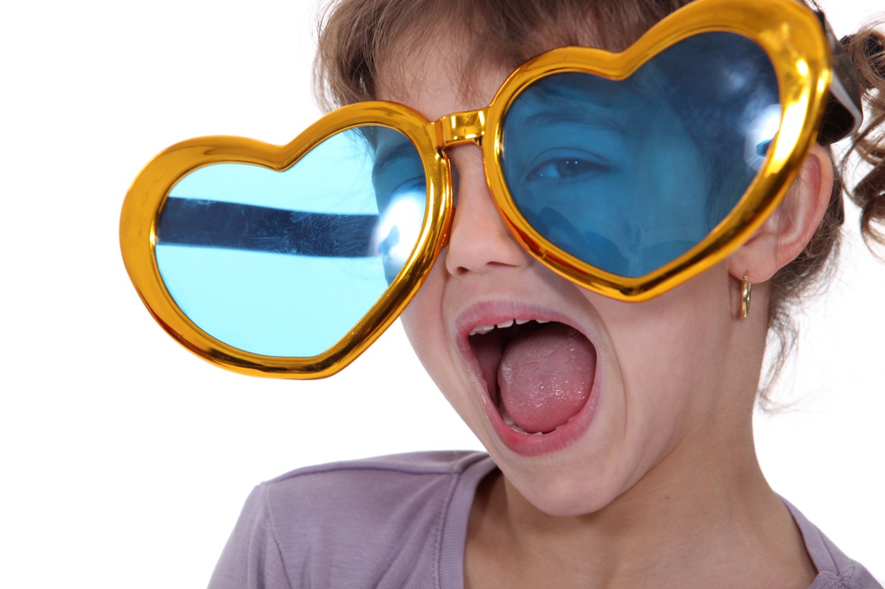 Little girl wearing funny sunglasses