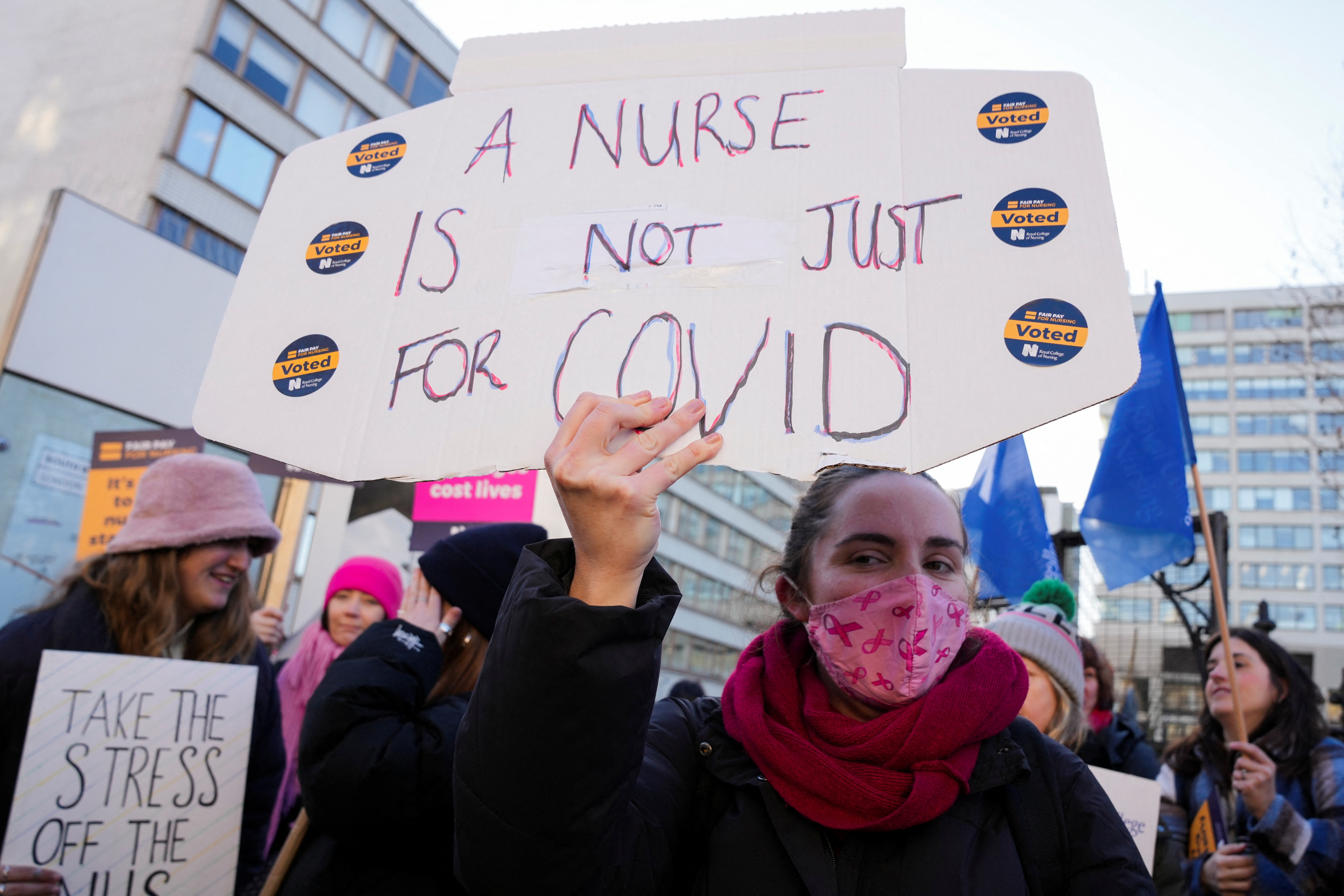 Reuters - Nurses strike outside St Thomas' Hospital in London