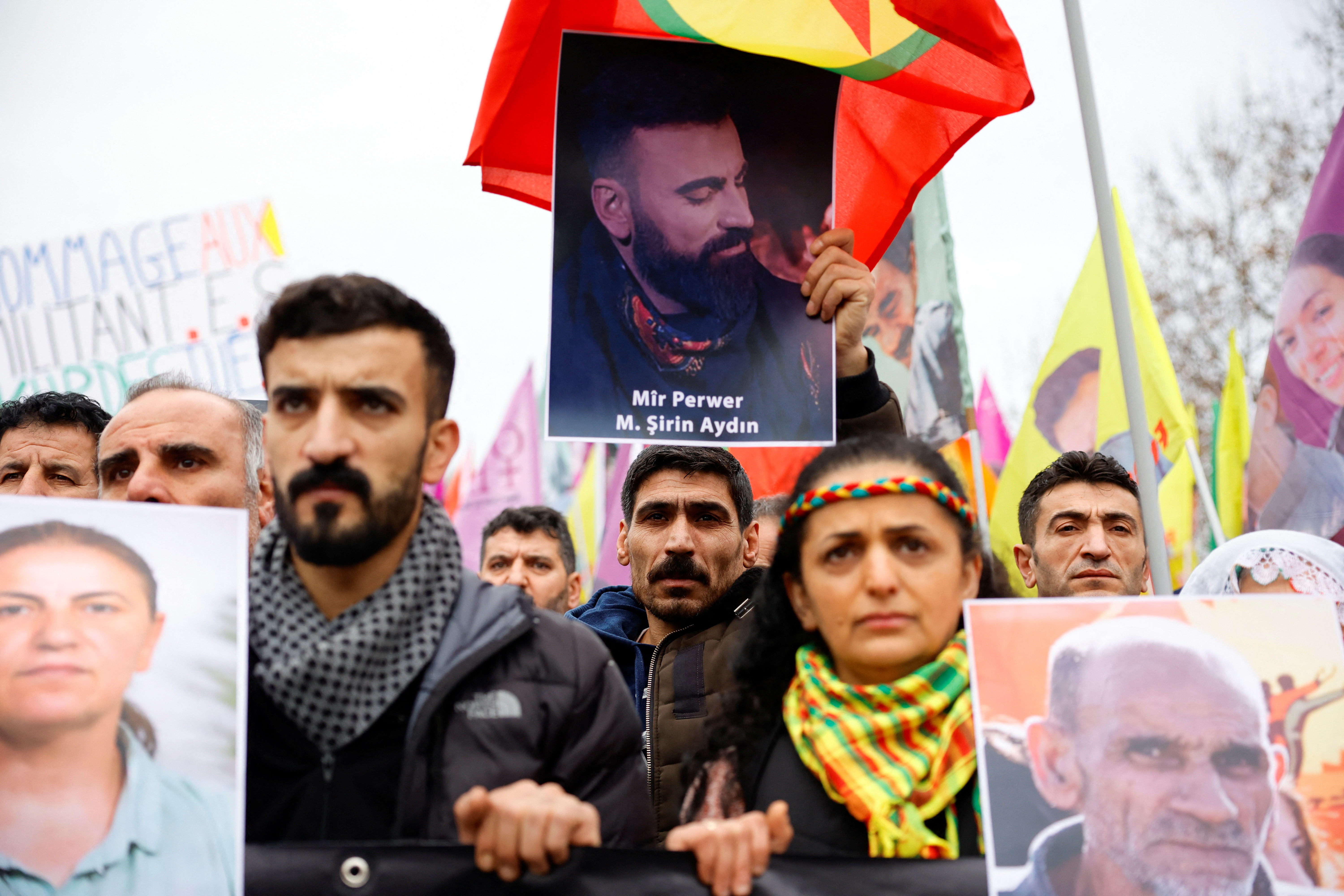 Members of the Kurdish community gather at Place de la Republique square following the shooting, in Paris