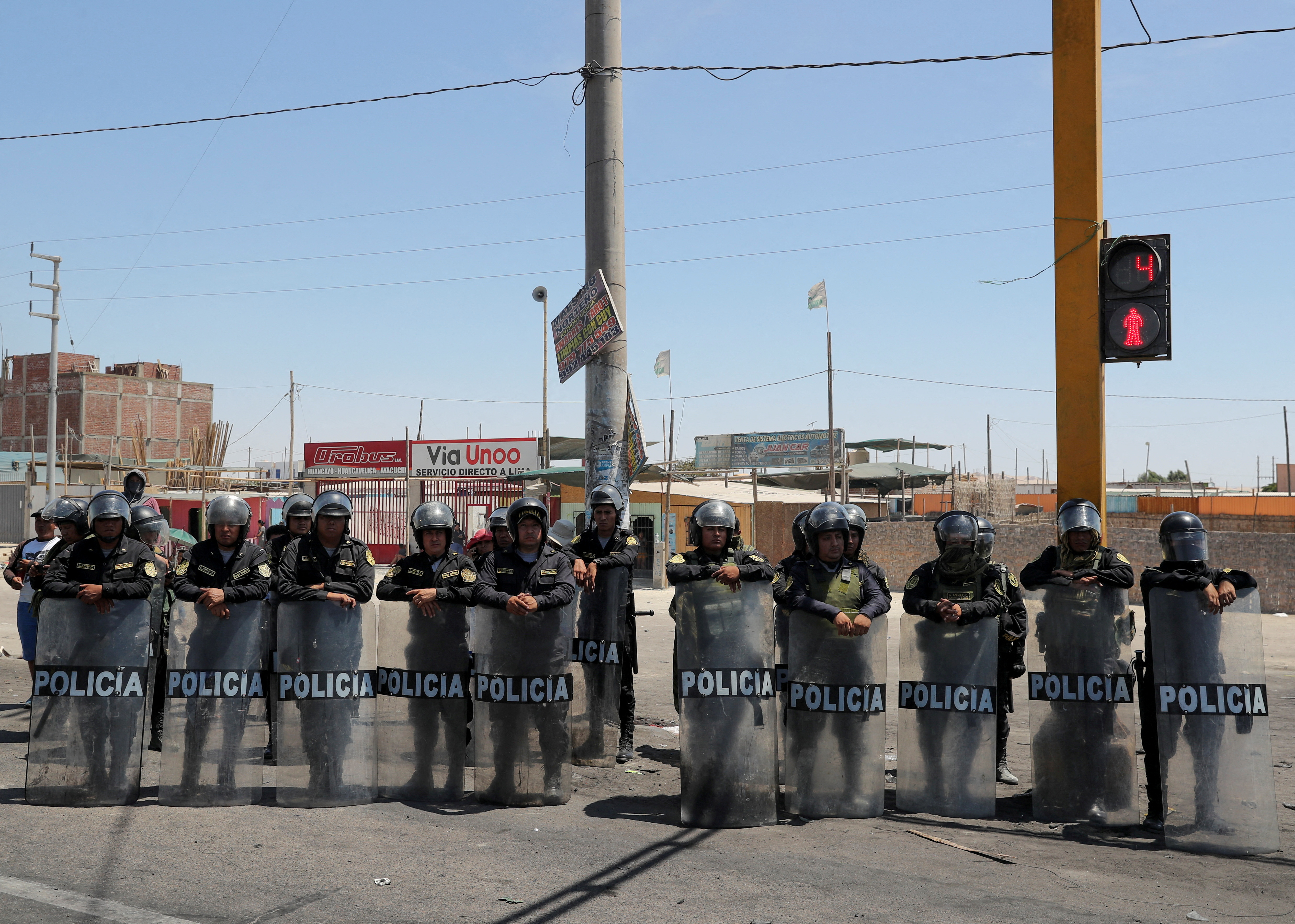 Demonstrators demand early elections and the release of ousted Peruvian leader Pedro Castillo, in Ica