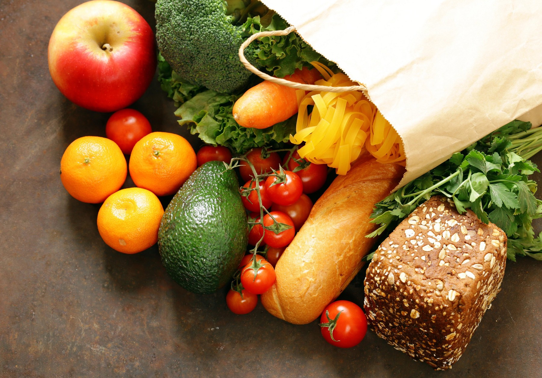 Grocery food shopping bag - vegetables, fruits, bread and pasta