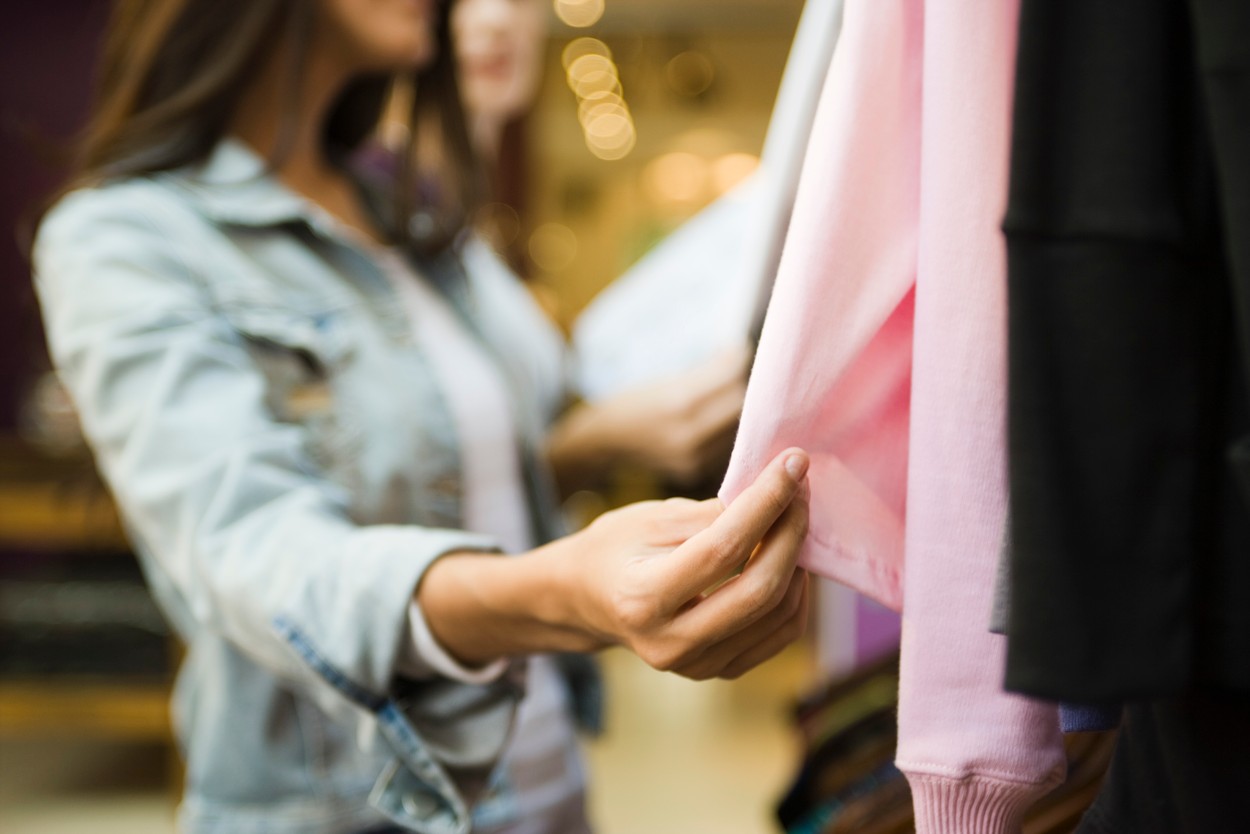 Woman shopping in clothing store