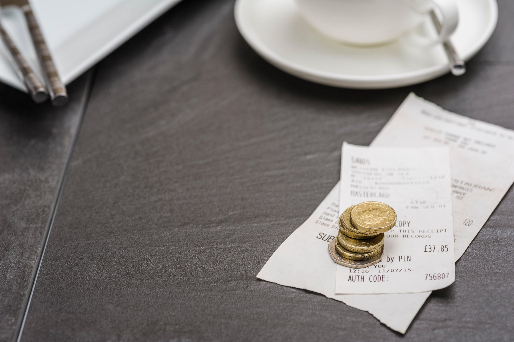 Bill or check with a tip.