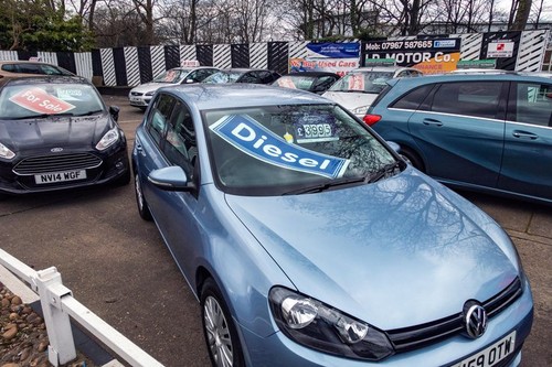 Diesel car sign in car windscreen at a Used Cars on sale at a Second Hand Car sales pitch at the side of the road