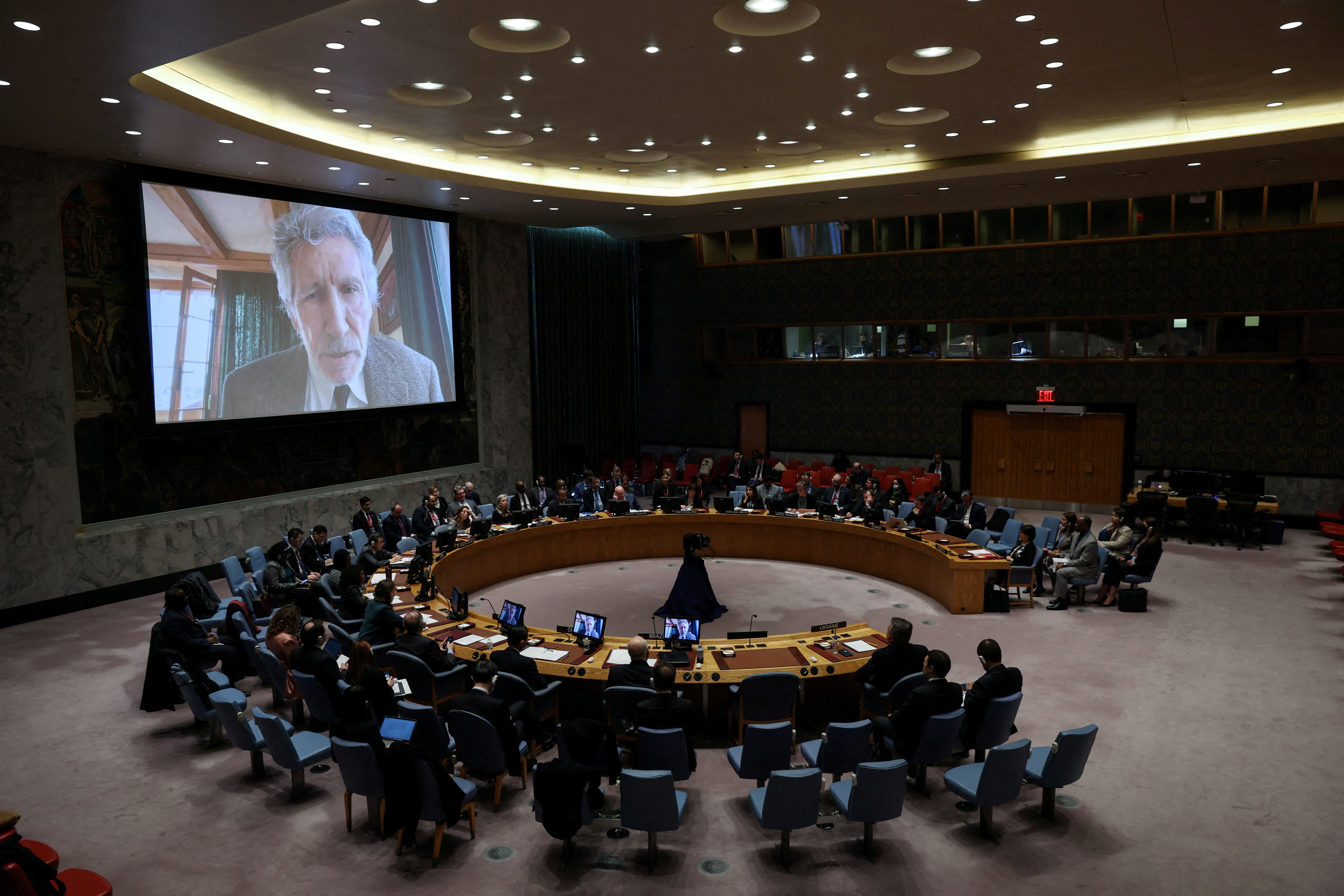 Pink Floyd co-founder Roger Waters is seen speaking on a video screen during a U.N. Security Council meeting on Ukraine at the United Nations headquarters in New York City