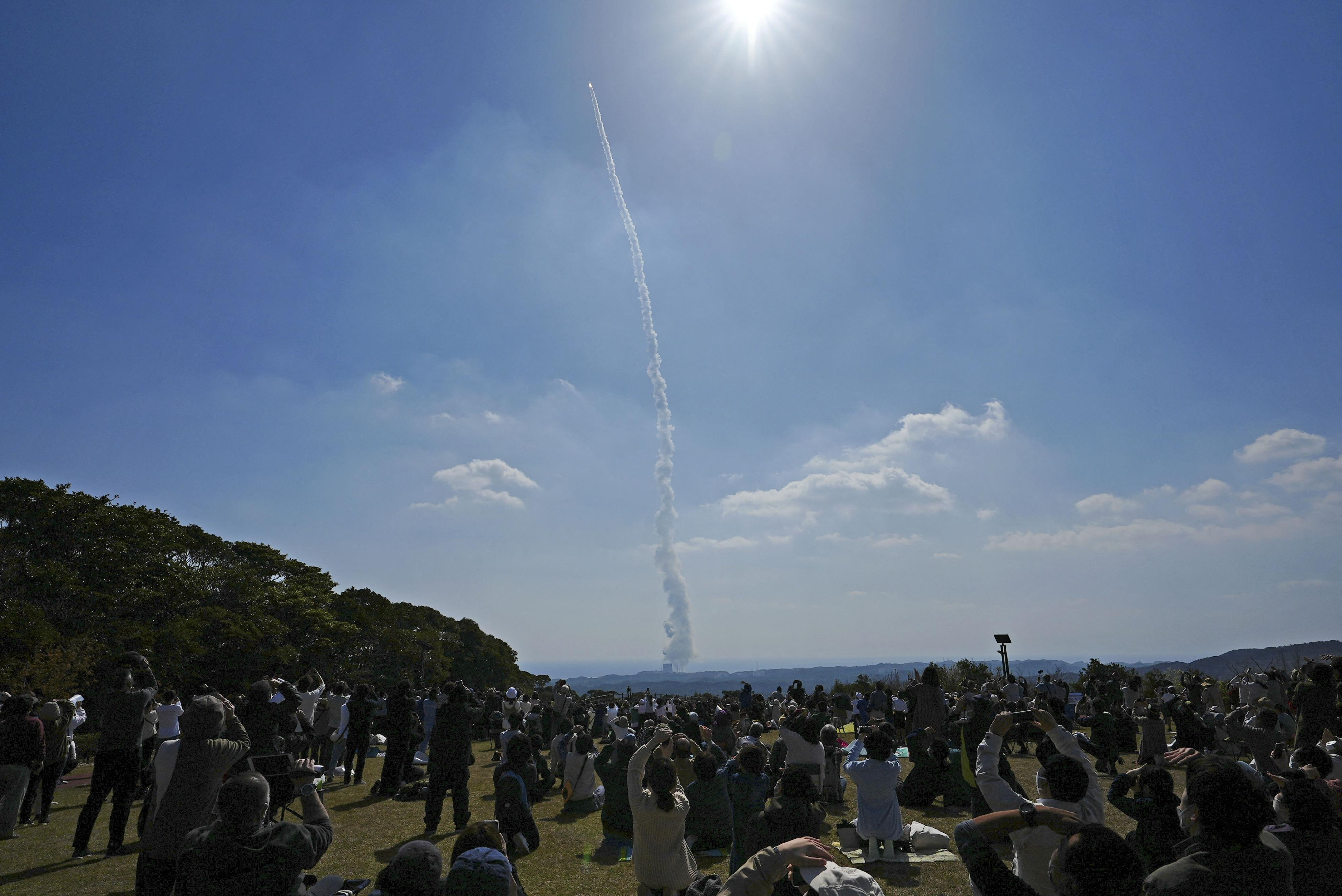 An H3 rocket carrying a land observation satellite lifts off from the launching pad at Tanegashima Space Center on the southwestern island of Tanegashima