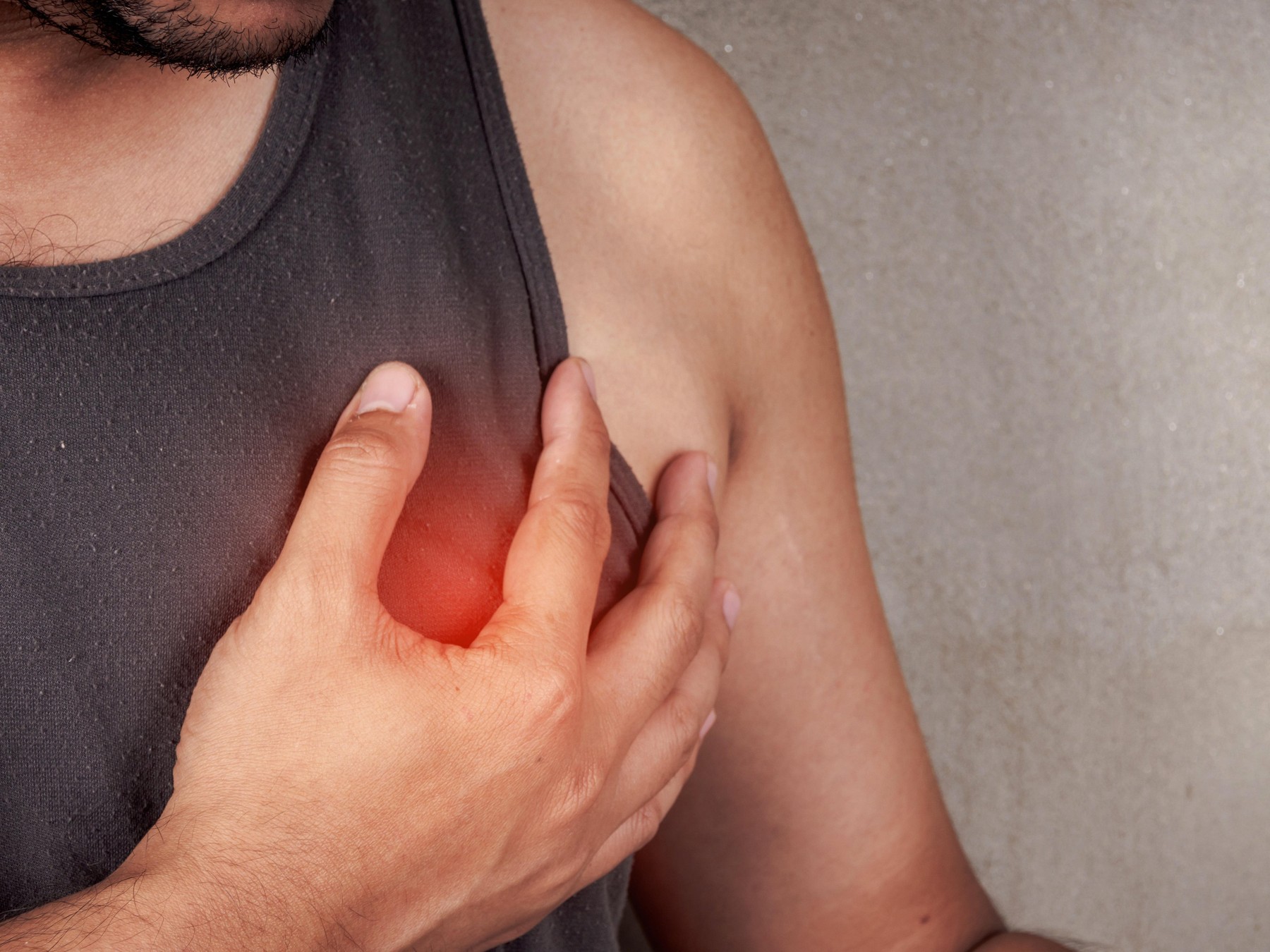 Man having chest pain, heart attack.