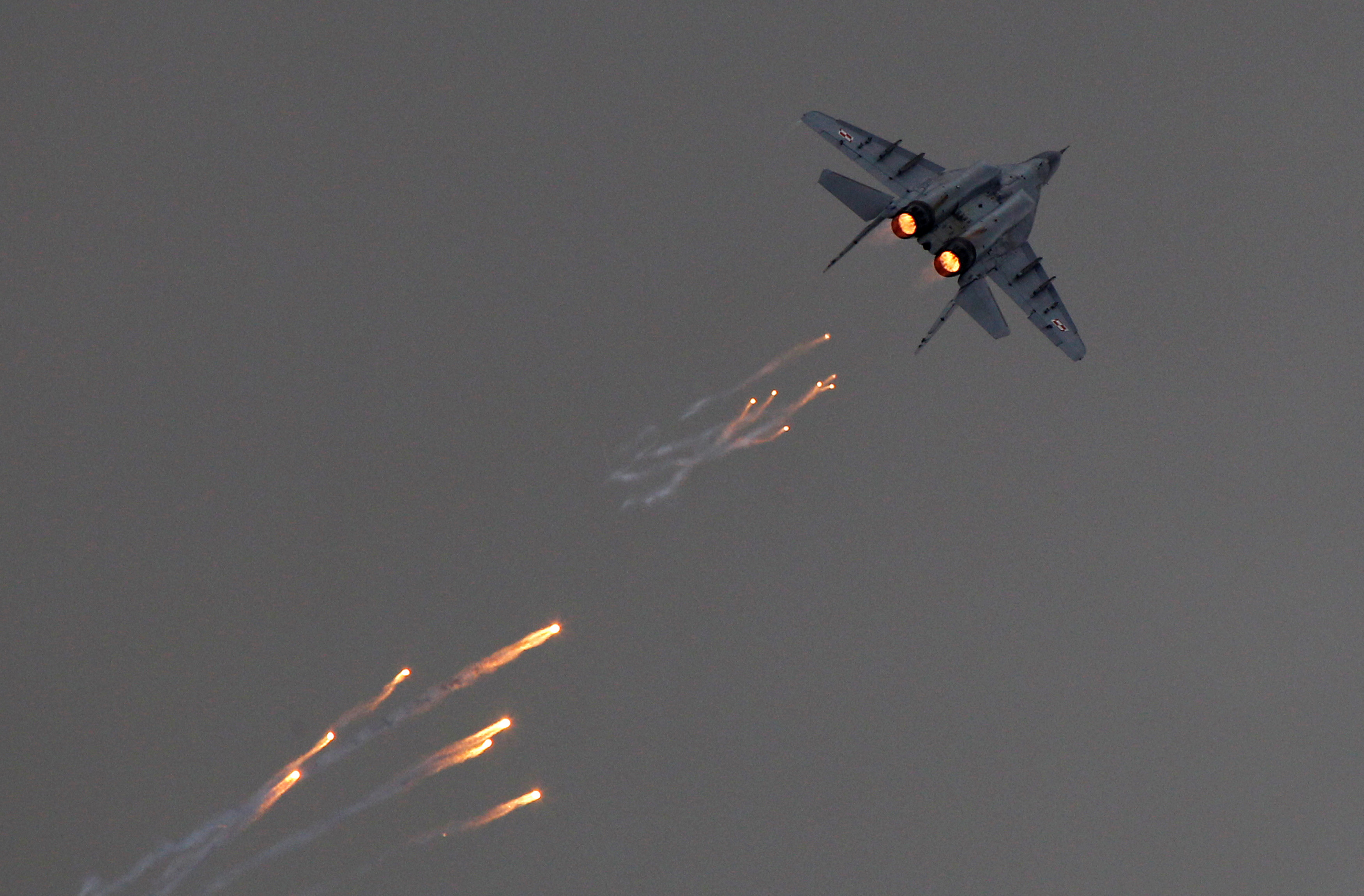 FILE PHOTO: A Polish Air Force MiG-29 aircraft fires flares during a performance at the Radom Air Show at an airport in Radom