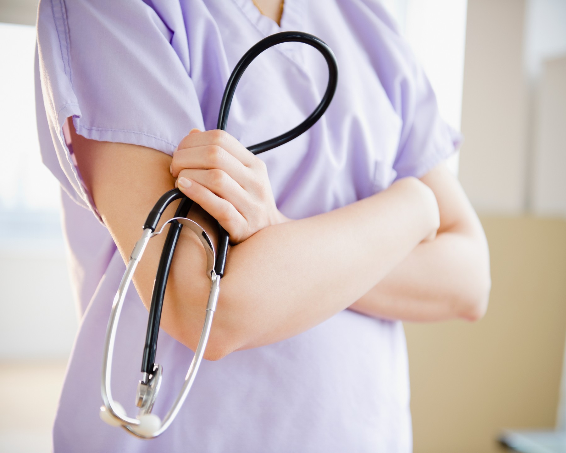 Close up of female doctor with stethoscope
