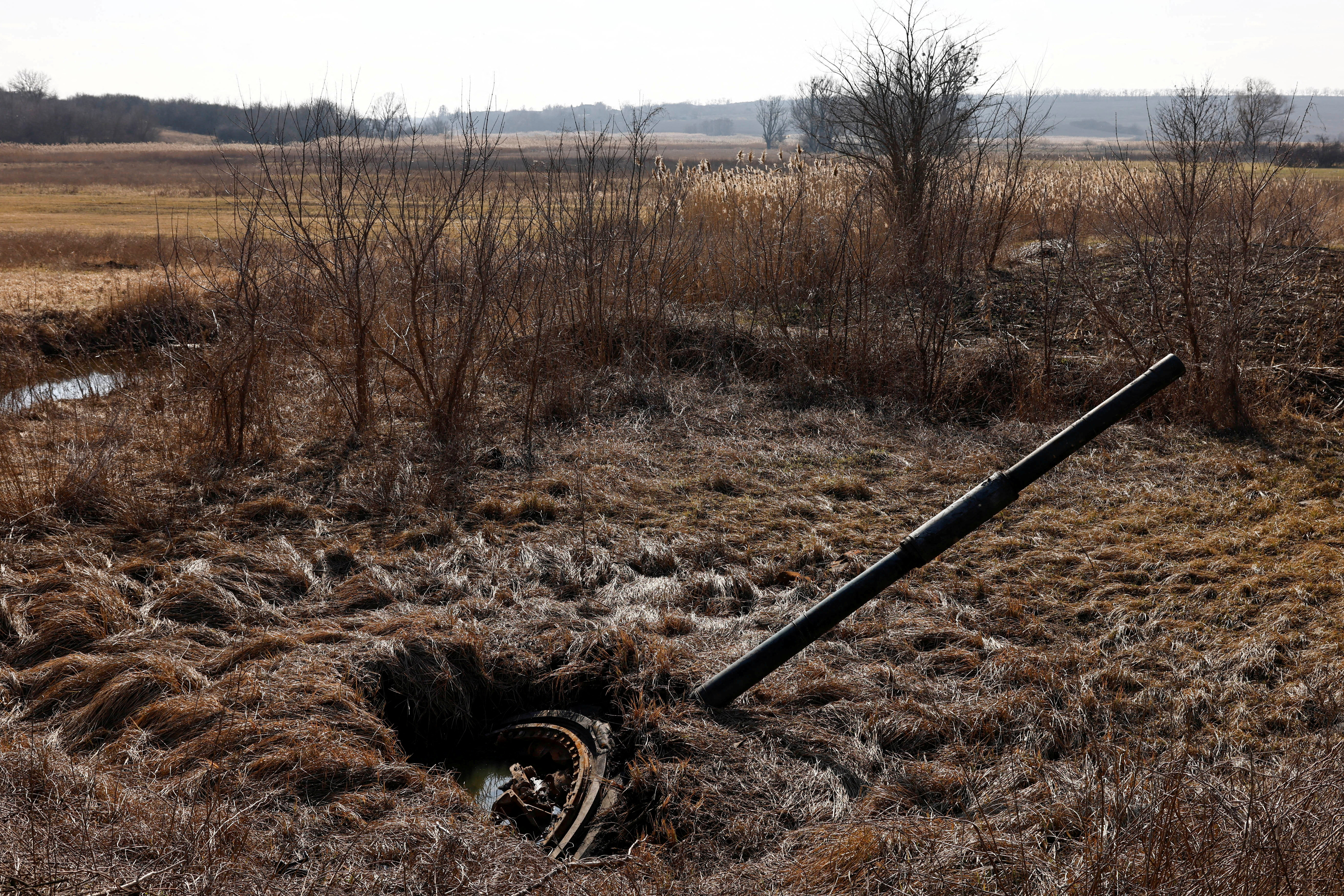 A tank turret is seen stuck in the ground, amid Russia's invasion of Ukraine, near Lyman