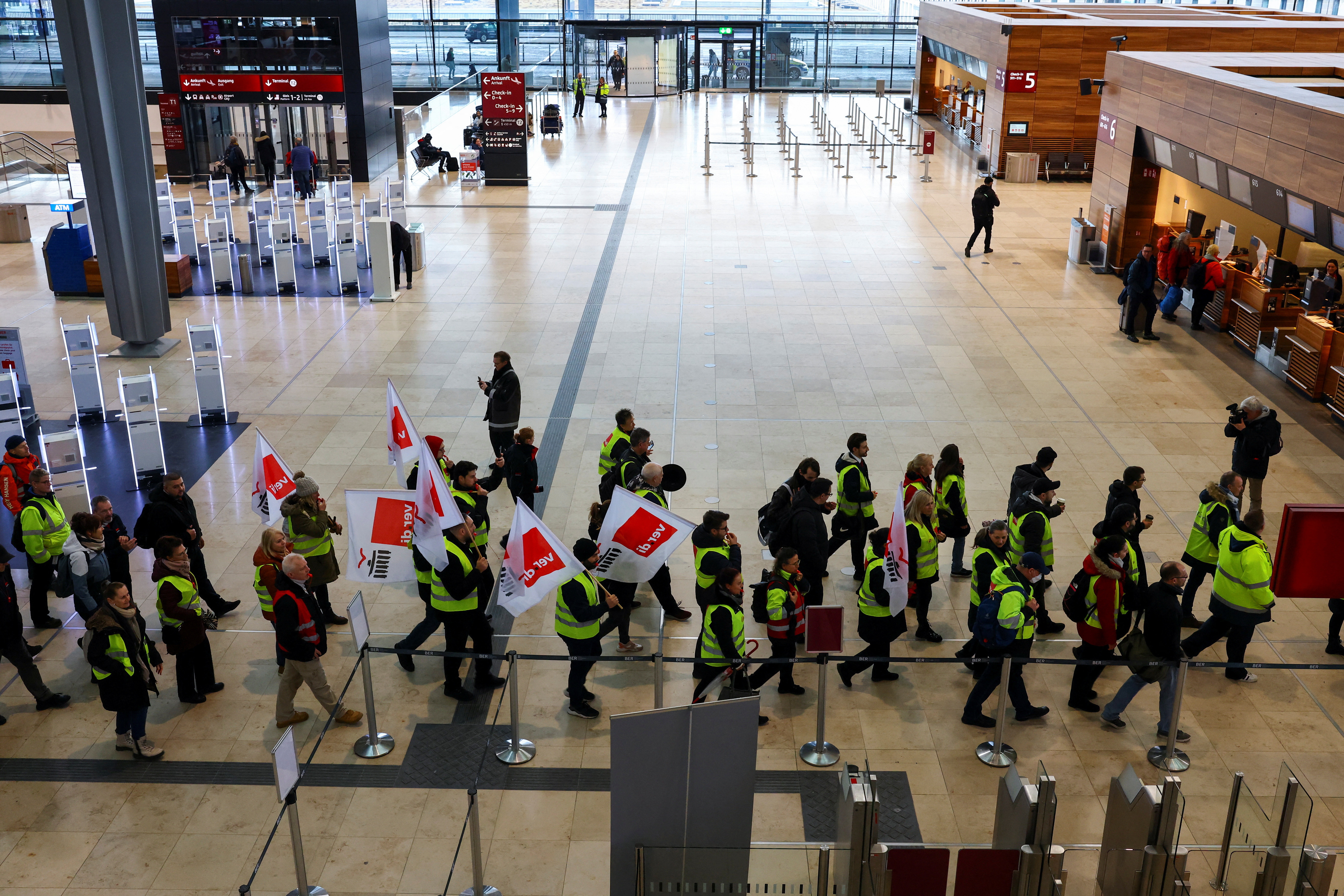 Airport workers protest at BER airport during a strike called by German trade union Verdi, in Berlin