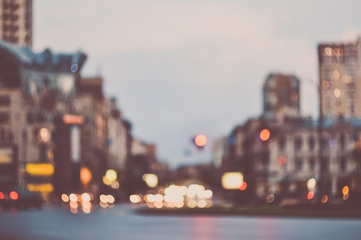 Blurred evening city street car lights background