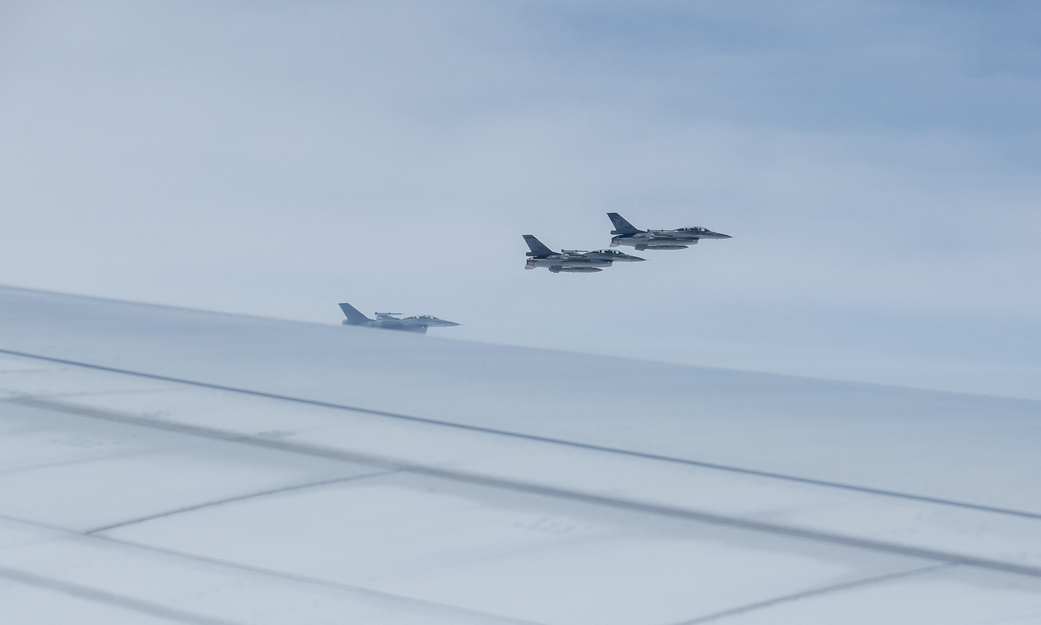 Taiwan Air Force F-16 fighter jets fly near the airplane transporting Taiwan’s President Tsai Ing-wen during her trip to Guatemala and Belize, stopping in New York