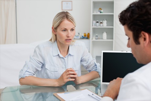 Excited woman seeing the doctor