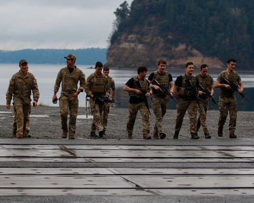 JOINT BASE LEWIS-MCCHORD, Washington- British Soldiers conducts a ruck march while participating in the Best Team Competition during Menton 2022 at Joint Base Lewis-McChord, Wash., Dec. 06. Menton Week is an annual week-long remembrance of the deactivatio