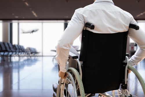 Disabled Adult People Travel In Wheelchair