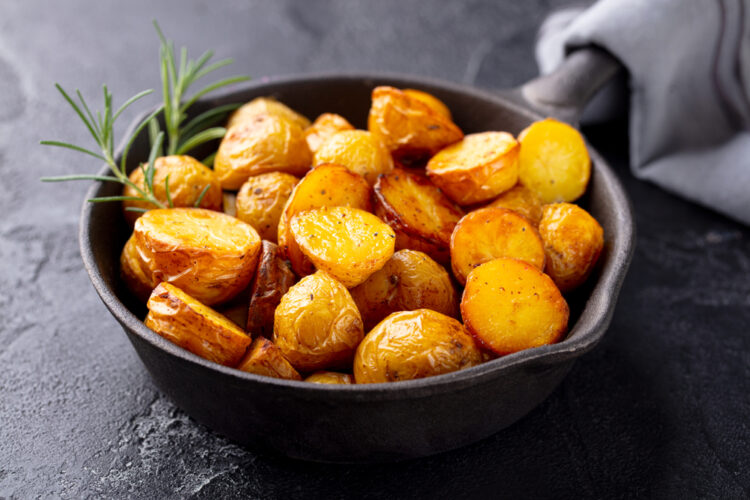 krumpir, Roasted,Baby,Potatoes,In,Iron,Skillet.,Dark,Grey,Background.,Close