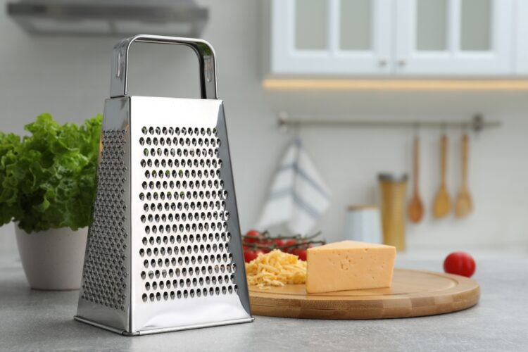 ribež, rende, Grater,And,Cheese,On,Table,In,Kitchen.,Space,For,Text