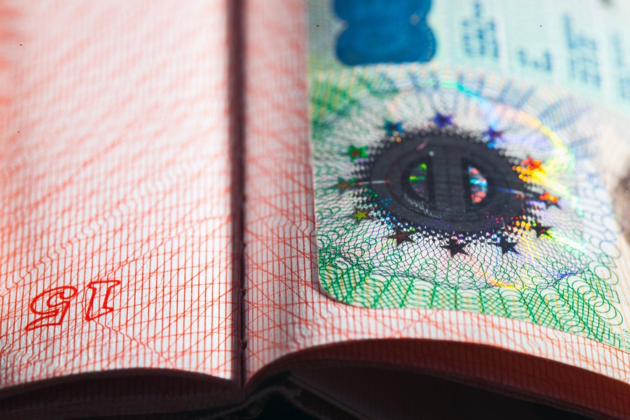 Schengen visa in the passport closeup selective focus