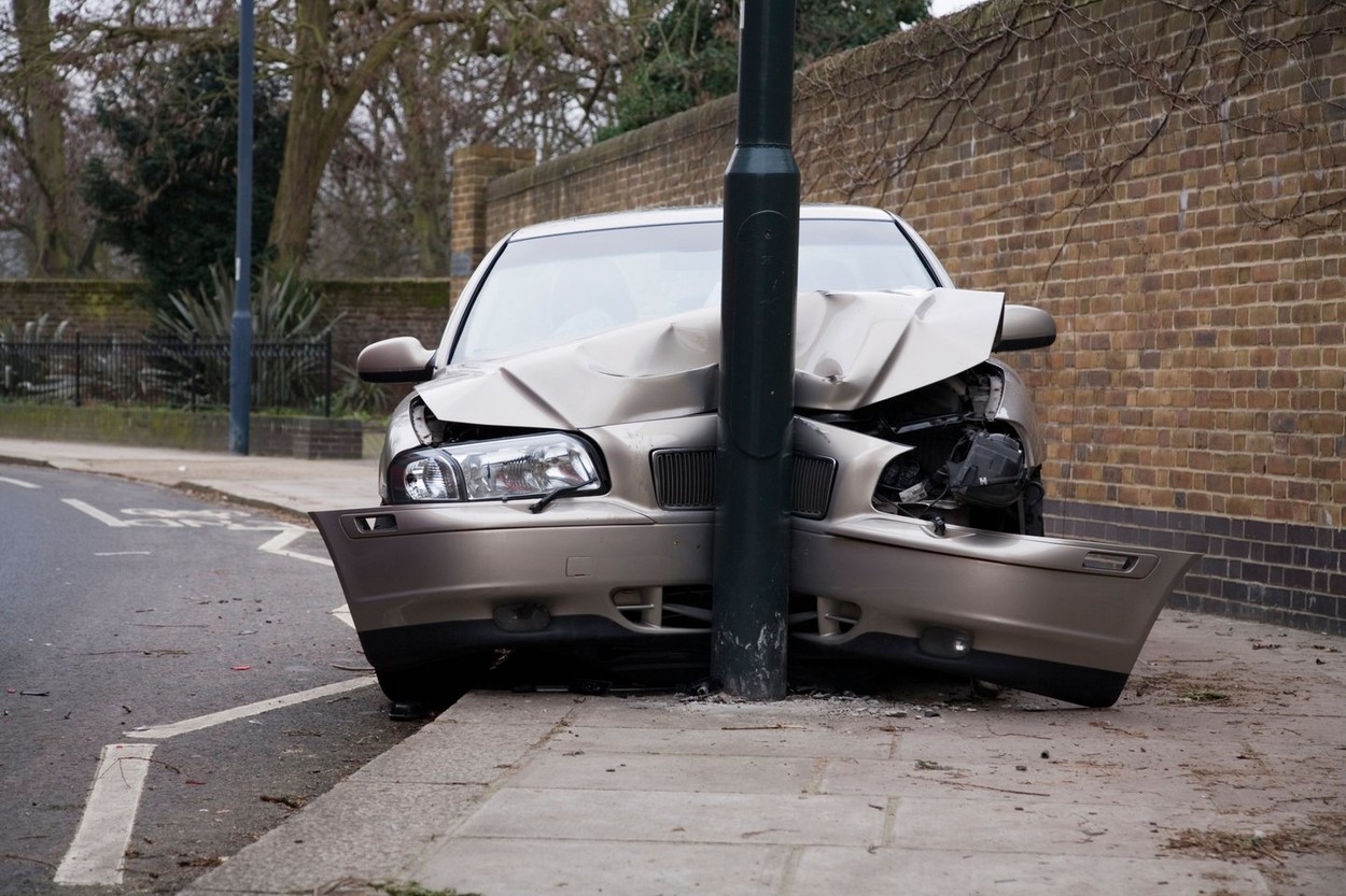 Car Volvo S80 D5 which has crashed into a lamp post UK