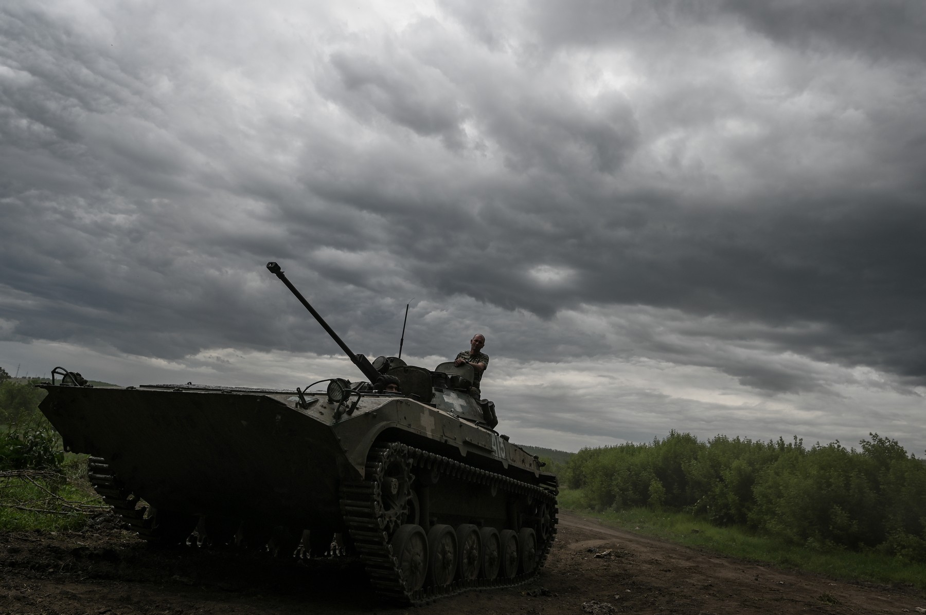 Donetsk Region, Ukraine: Mechanics and armored vehicle crewmembers of the Ukrainian Armed Forces conduct tests and repairs on damaged and captured armored personnel carrier vehicles.
