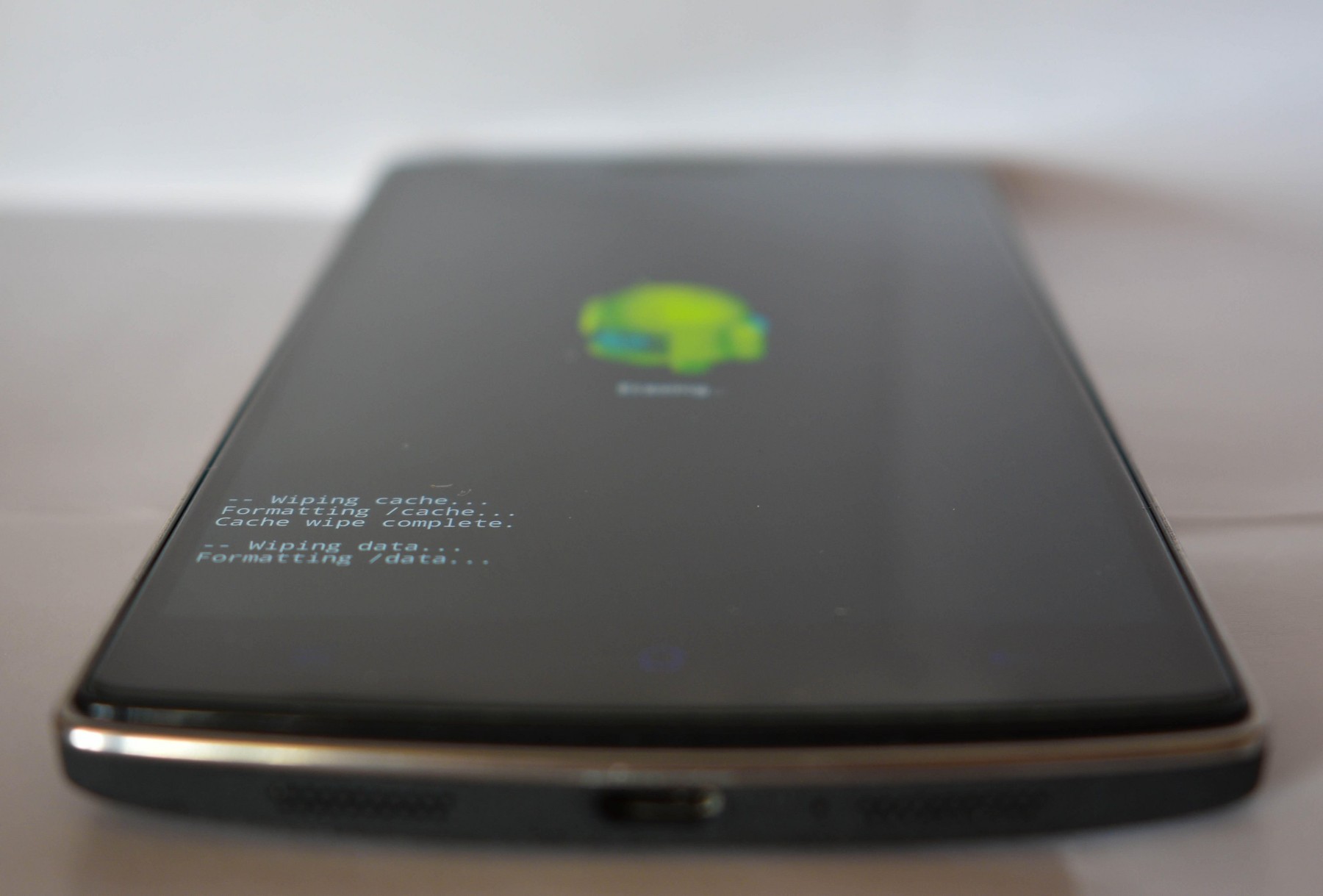 A smart phone being factory reset. Smartphone.