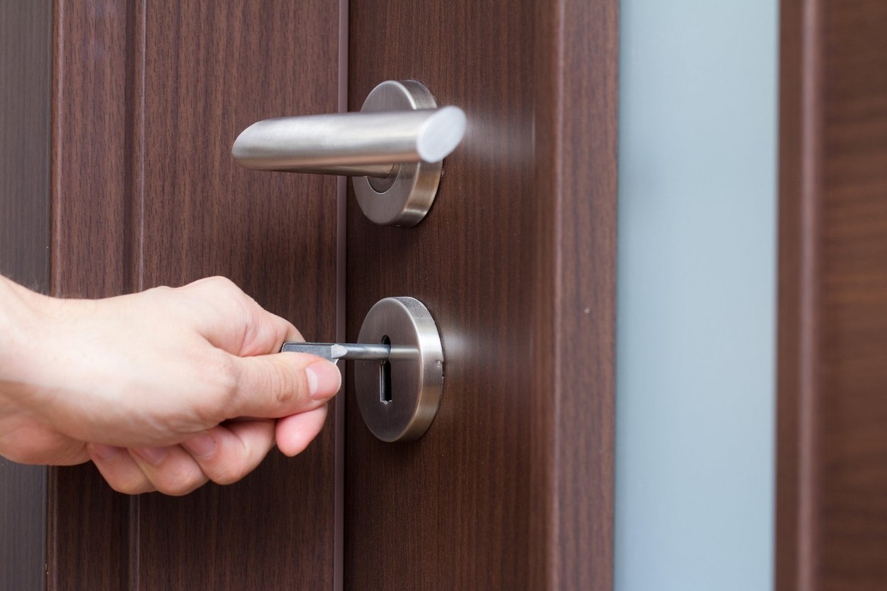 hand unlocking house door