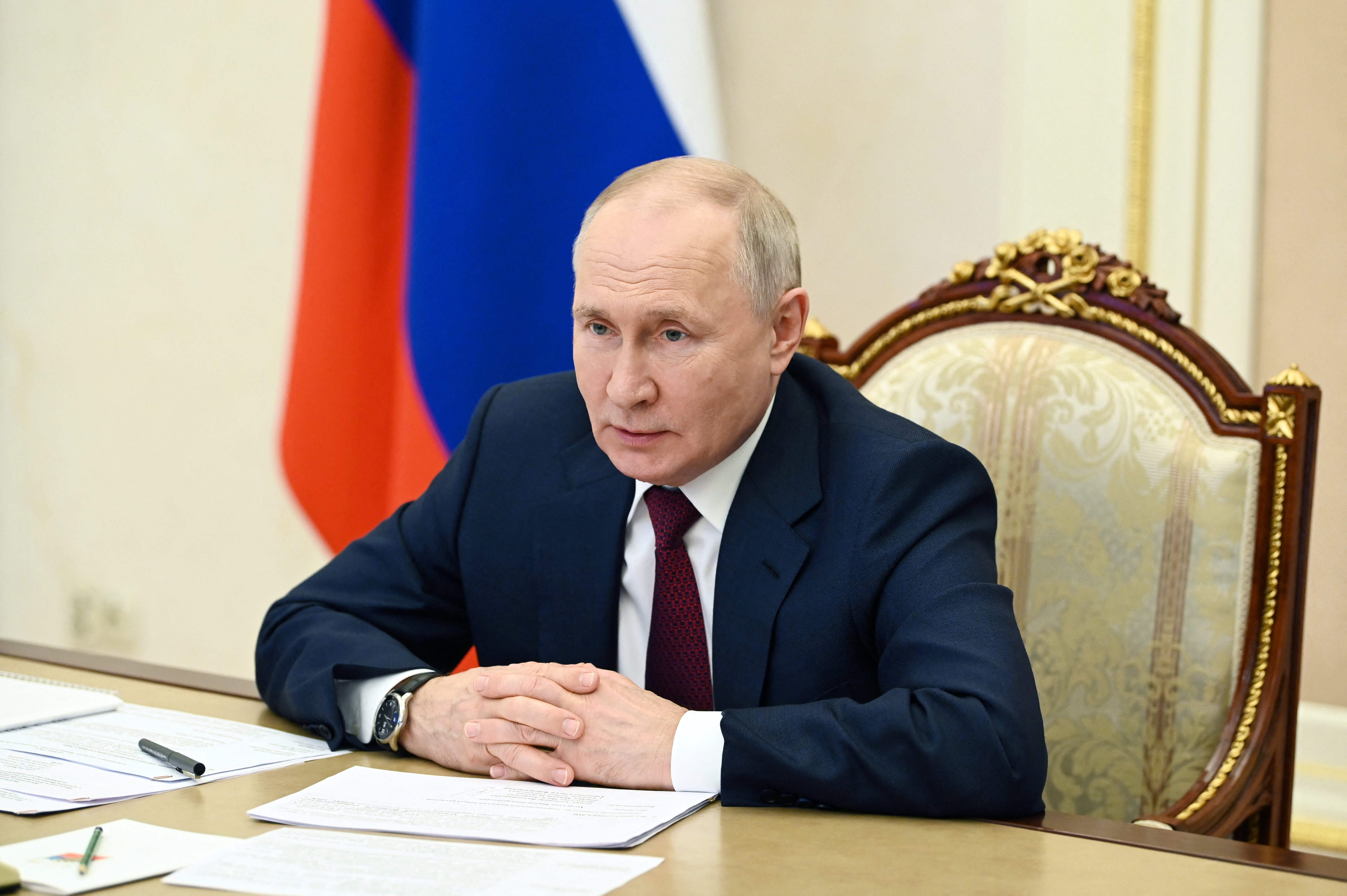 Russian President Putin chairs a meeting with members of the government, via video link in Moscow