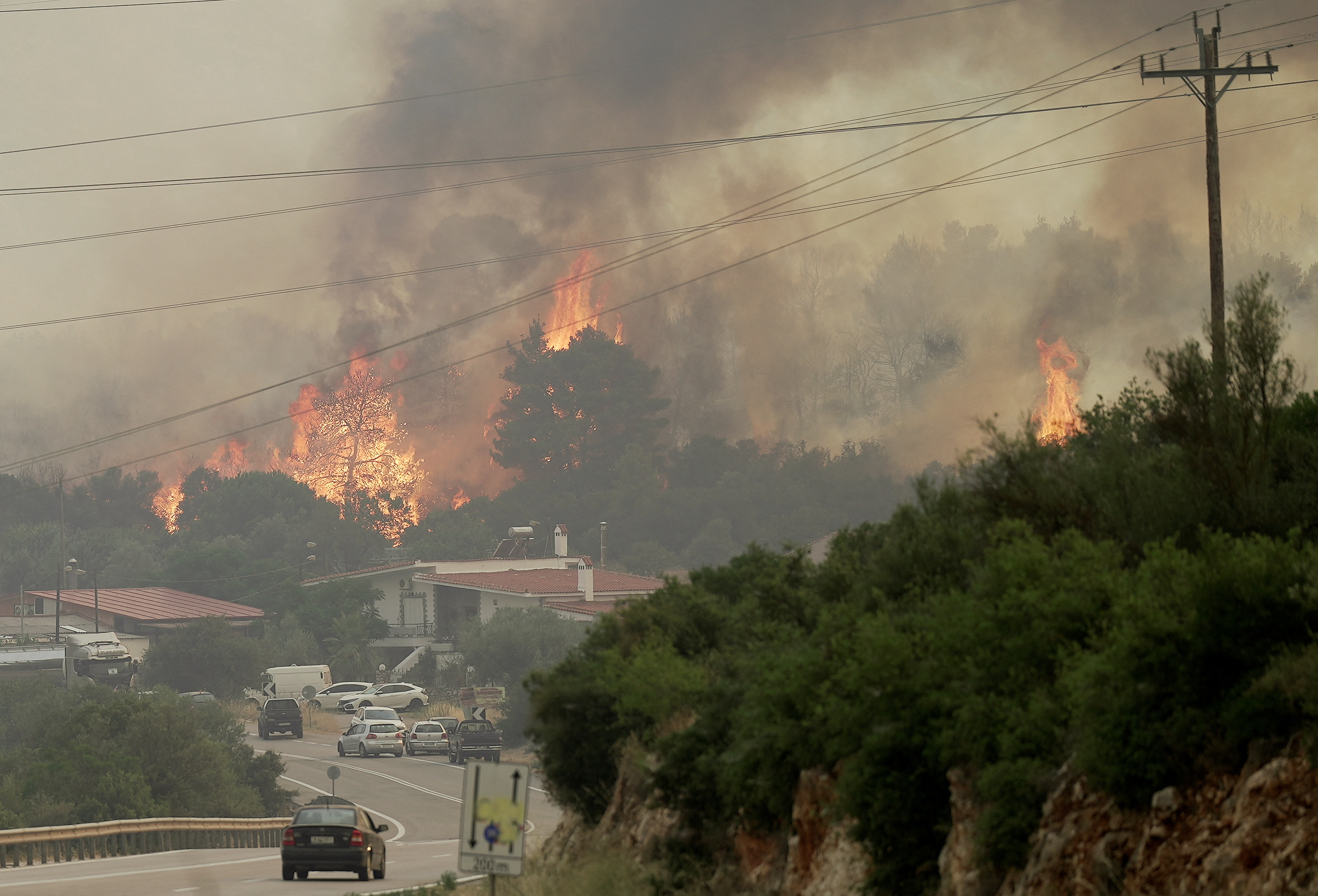Wildfire burns west of Athens