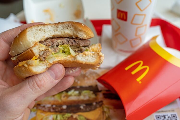 hamburger, junk food, brza hrana, mcdonalds, mc donalds,Man,Is,Eating,At,Mcdonald's,Restaurant.,Minsk,,Belarus,-,May,