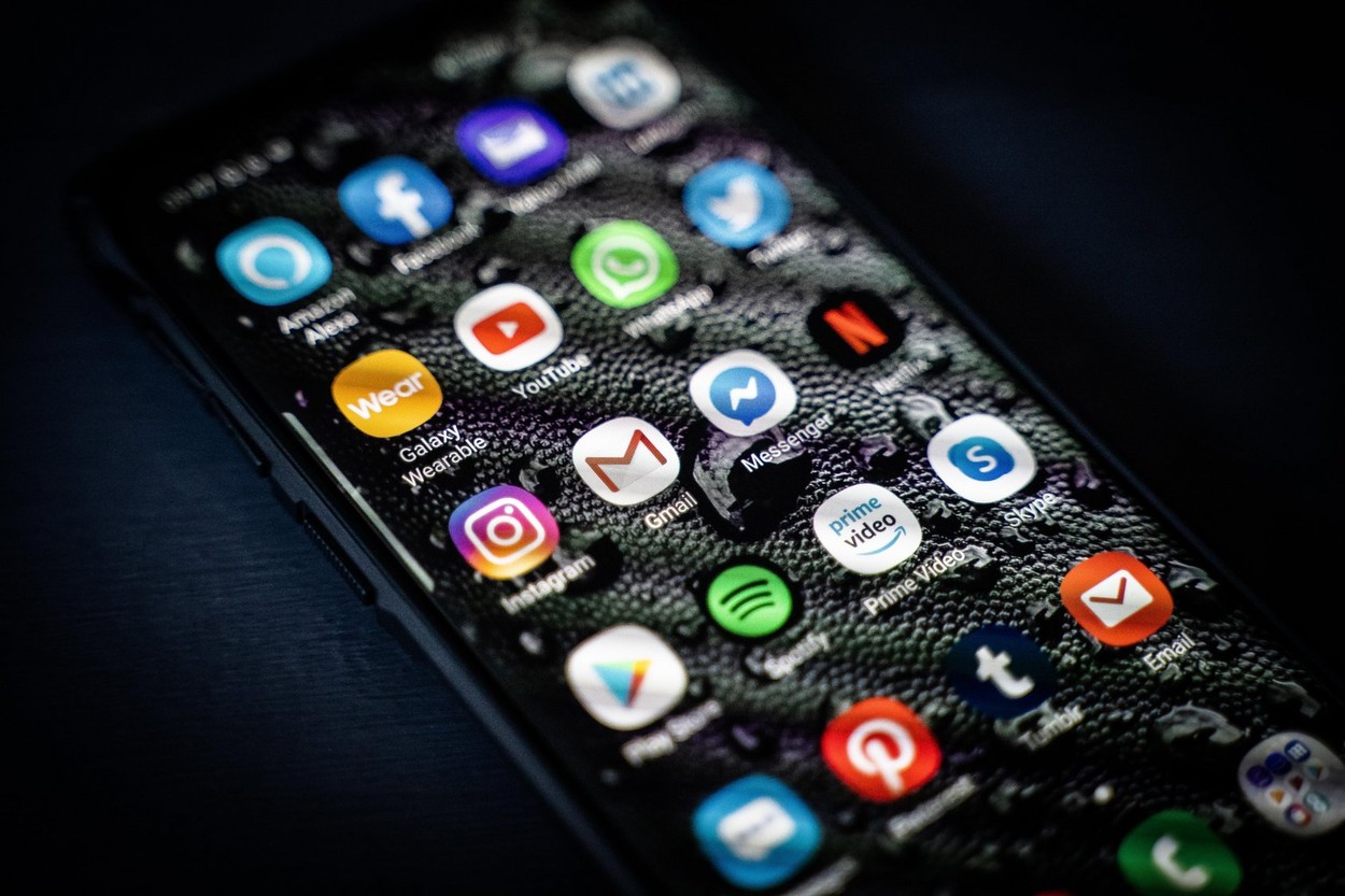 A smartphone screen with many social media and essential applications, apps on the screen, Facebook, Twitter, Gmail, Spotify, Instagram, WhatsApp etc
