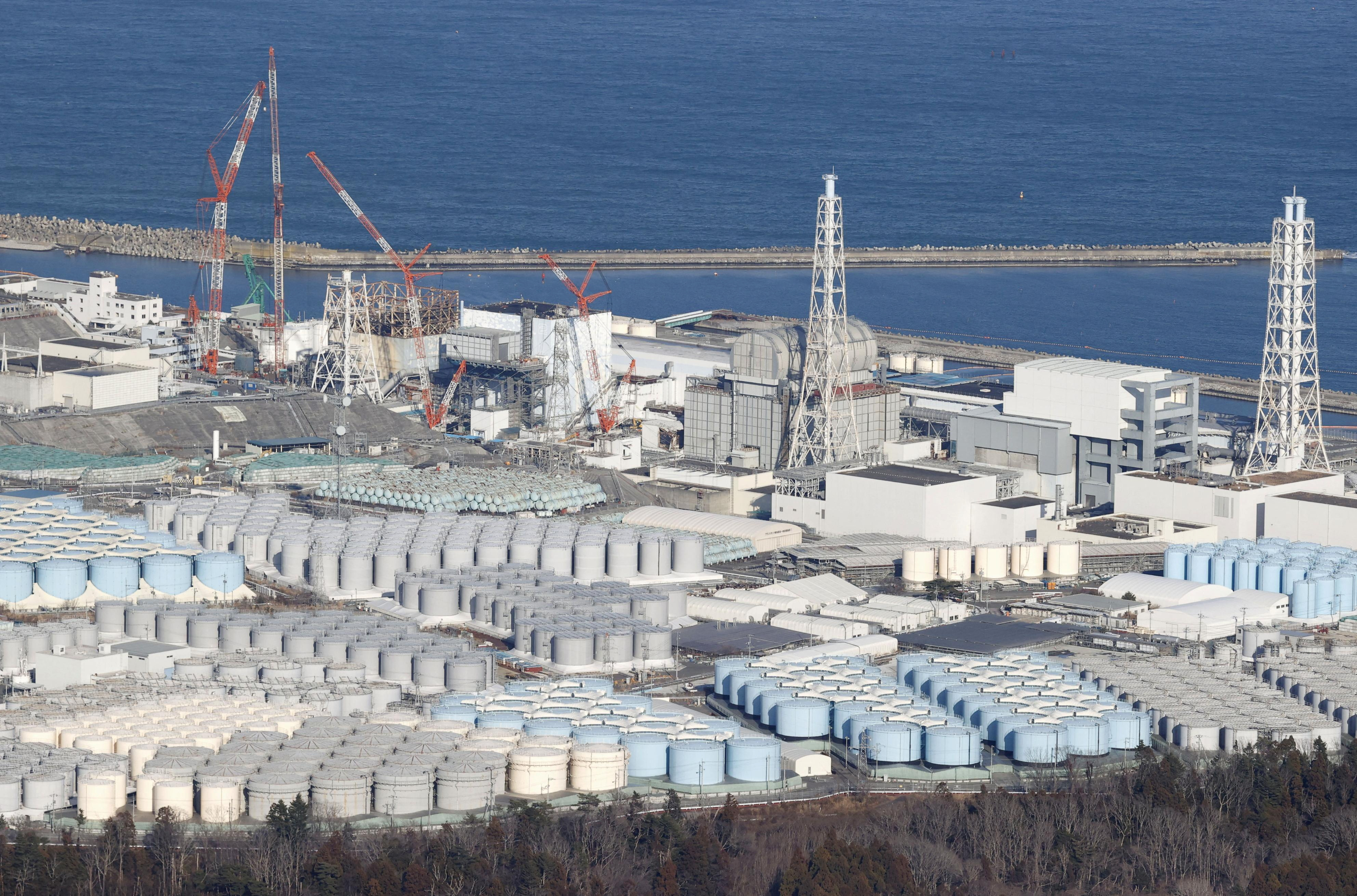 An aerial view shows the storage tanks for treated water at the tsunami-crippled Fukushima Daiichi nuclear power plant in Okuma town, Fukushima, Japan
