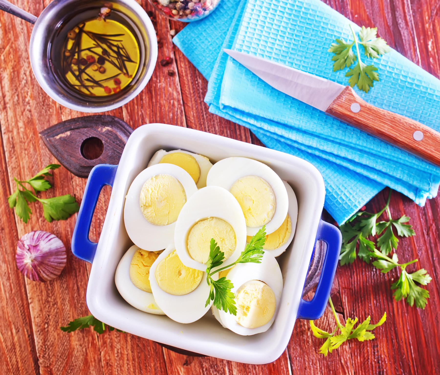 boiled eggs in bowl and on a table