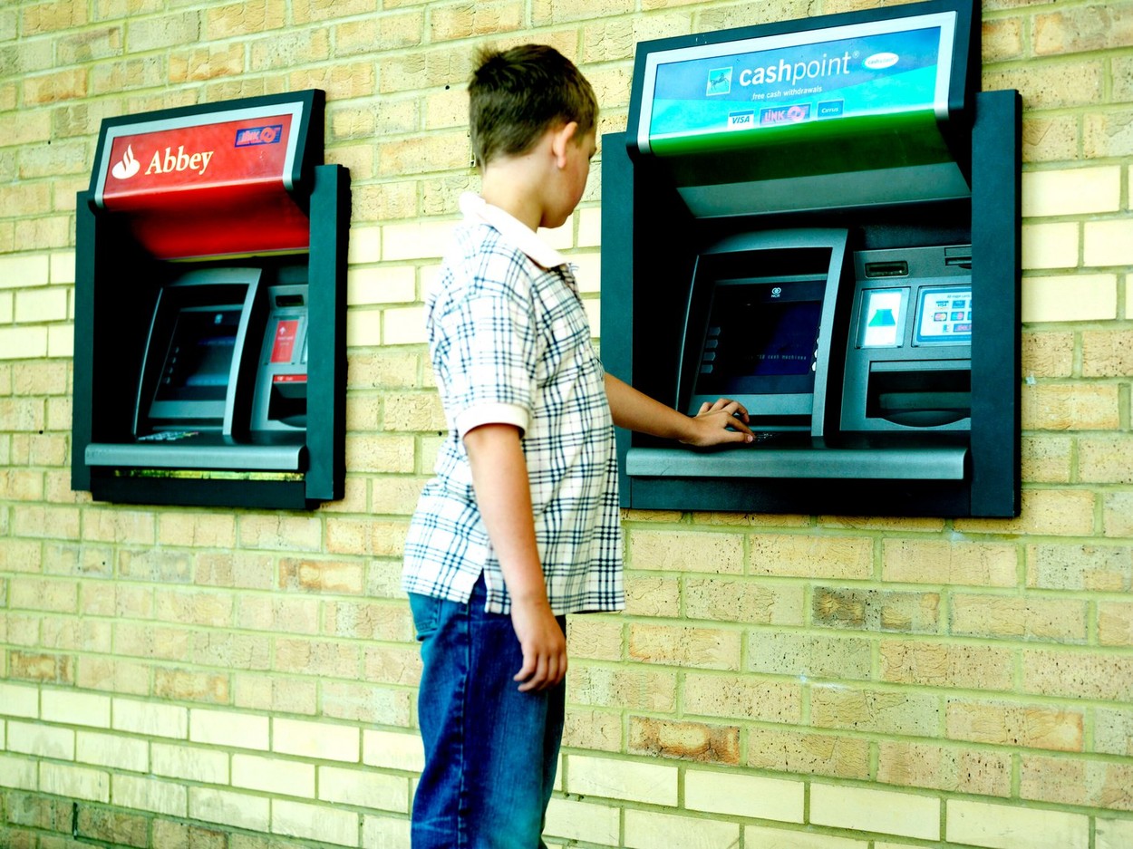 Young Boy Using ATM Bank Cash Point Model Released