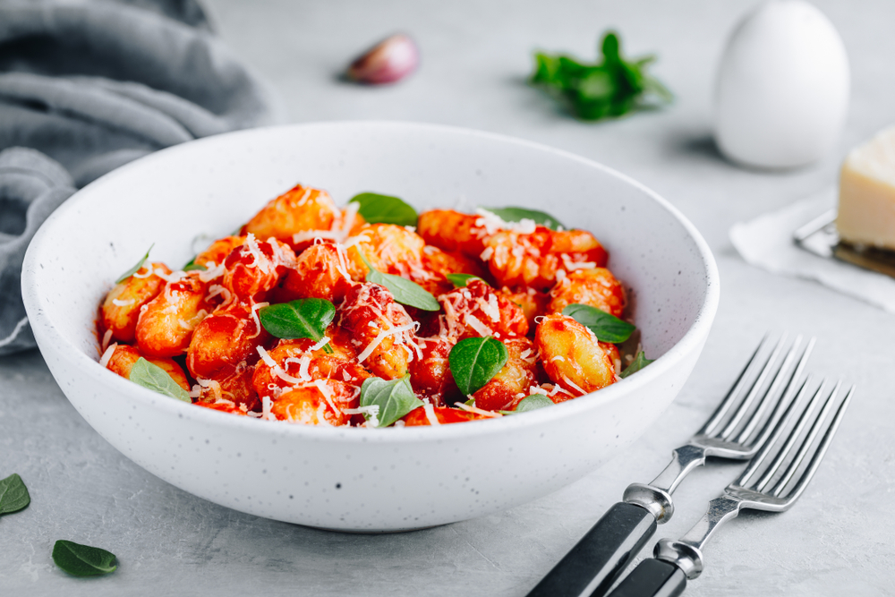 Traditional,Italian,Potato,Gnocchi,With,Tomato,Sauce,,Parmesan,Cheese,And