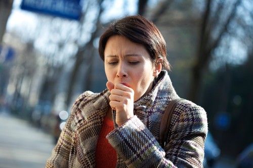 WOMAN COUGHING