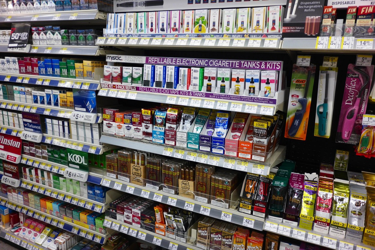 The disappearing vista of tobacco and nicotine products on display for retail sale at a drugstore.