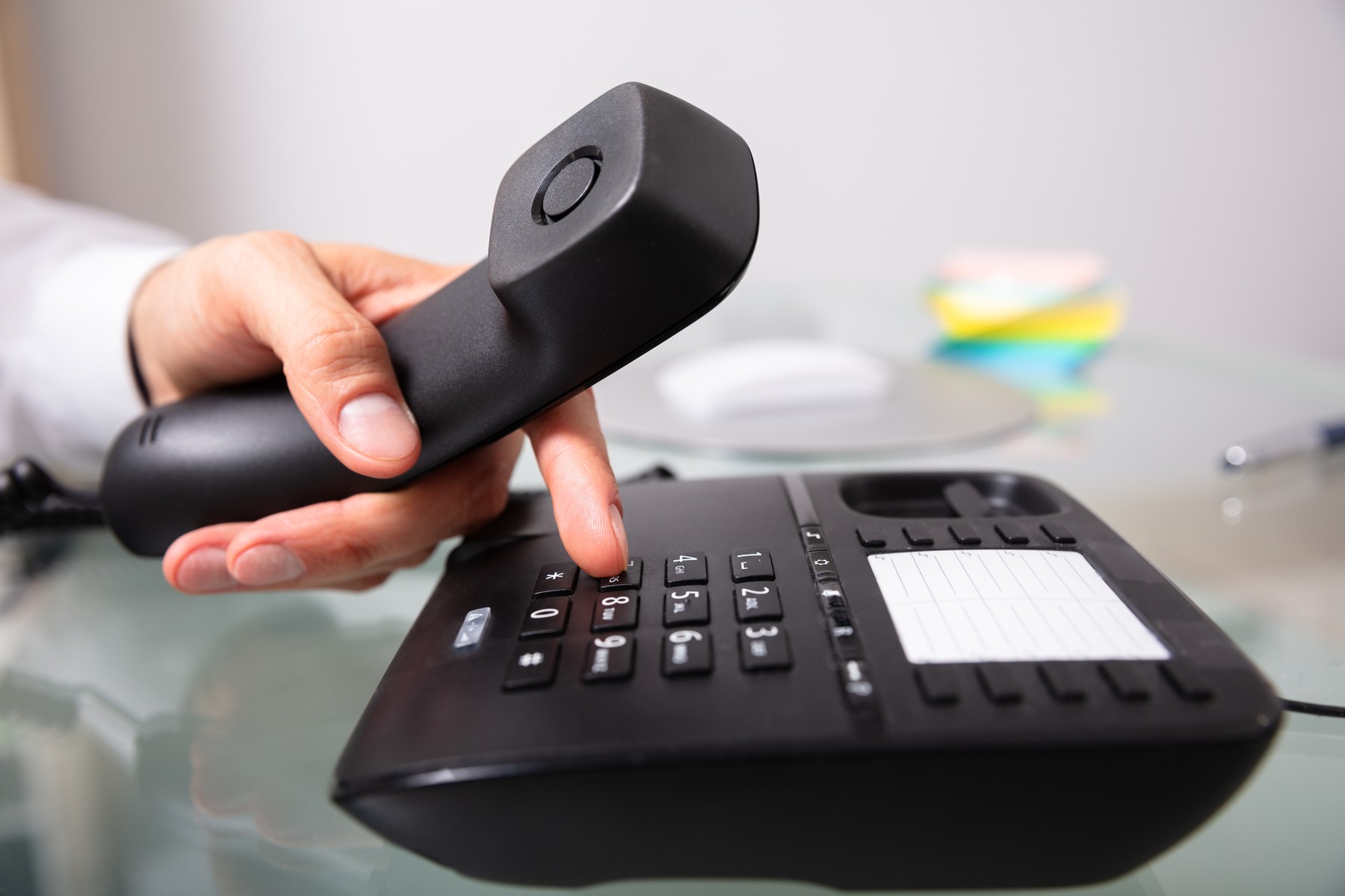Businessman Calling On Landline