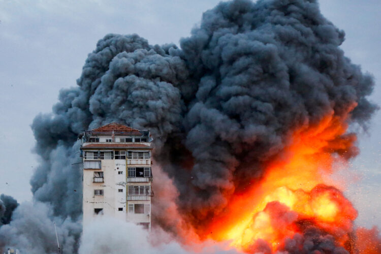 Smoke and flames billow after Israeli forces struck a high-rise tower in Gaza City