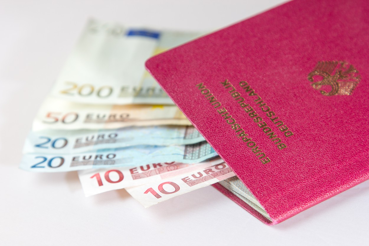 Euro Notes lying in the european passport from germany