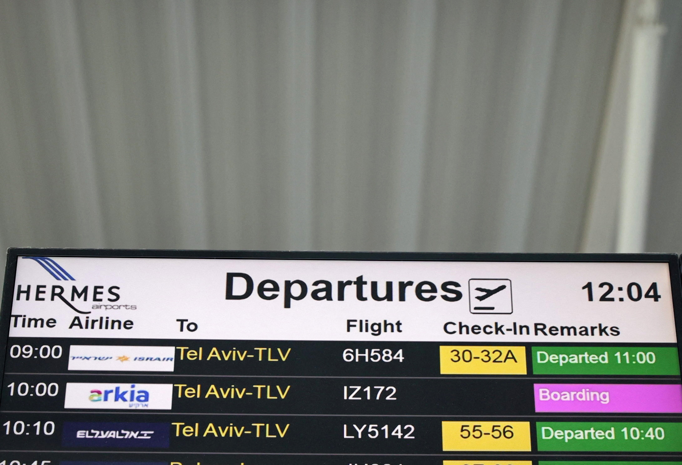 A departures board announcing flights to Tel Aviv, Israel, is seen in Larnaca International Airport, in Larnaca