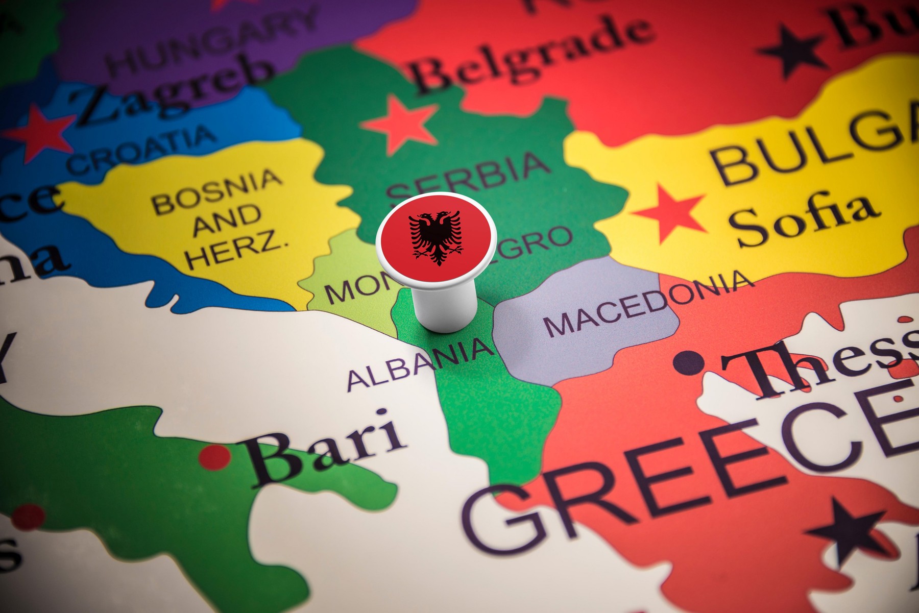 Albania marked with a flag on the map