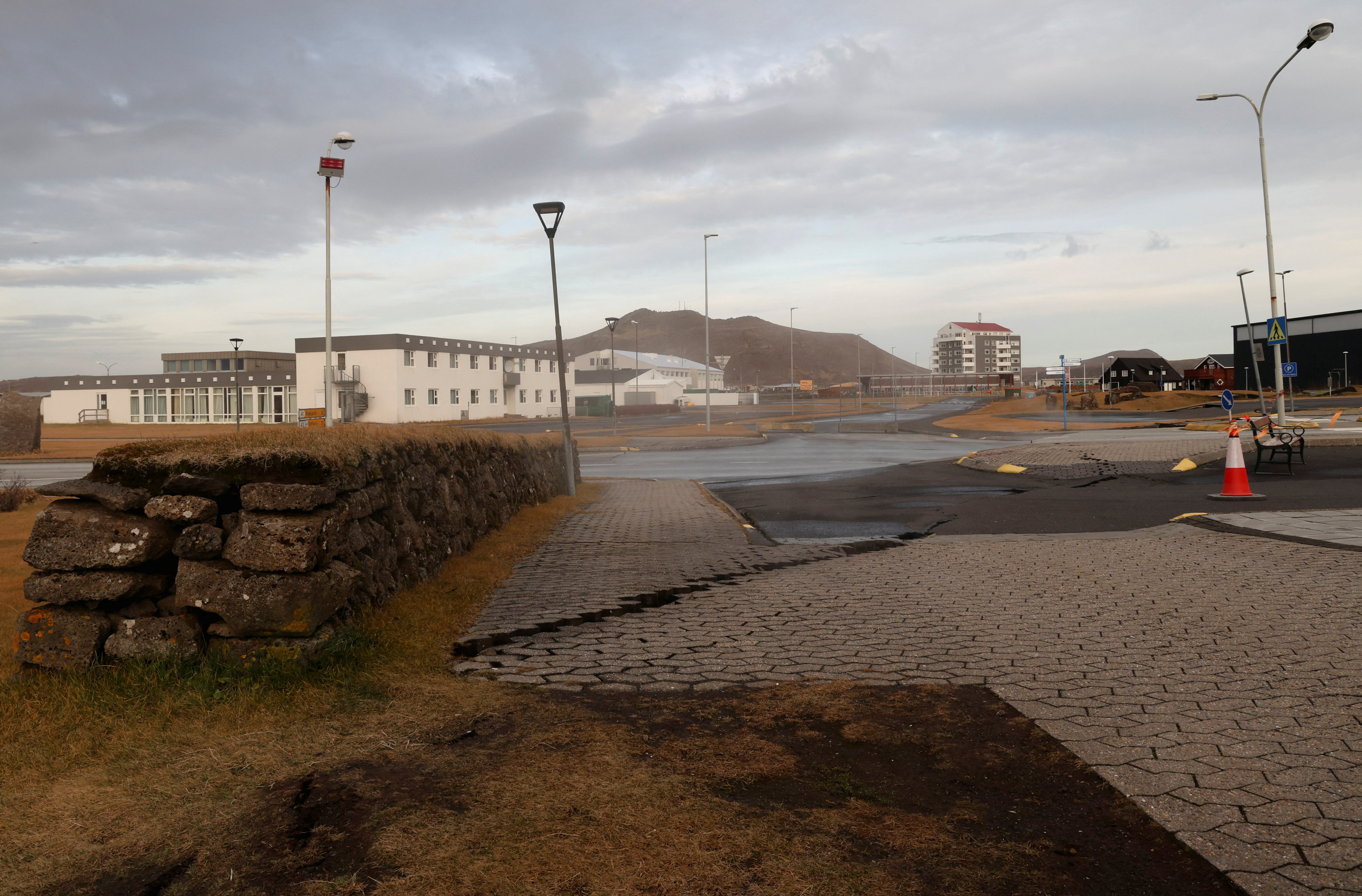 A road is damaged in Grindavik, which was evacuated due to volcanic activity.