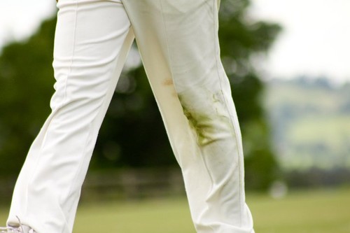 English cricketer's grass stained trousers